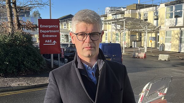 Al standing outside our local hospital 